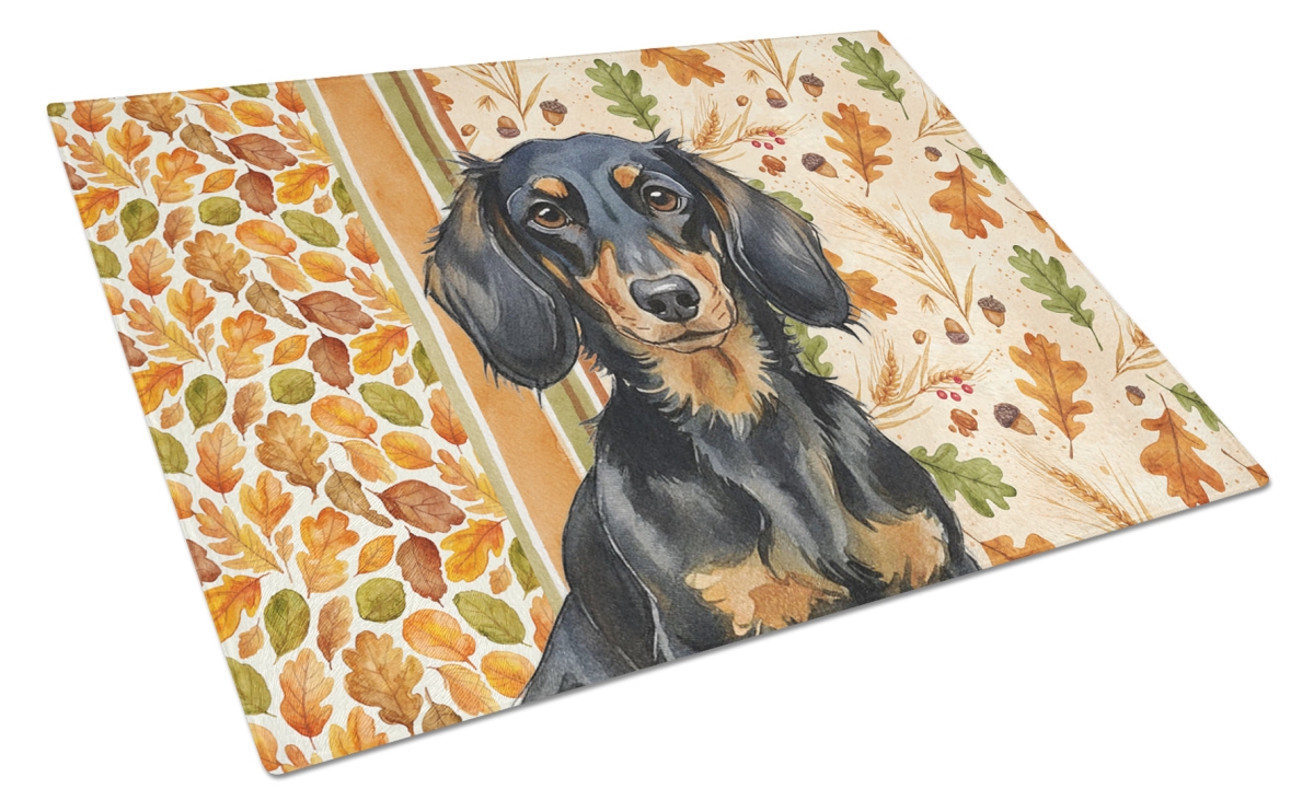 Picture of Carolines Treasures WDK7795LCB 15 x 12 in. Longhaired Black & Tan Dachshund Heirloom Fall Glass Cutting Board