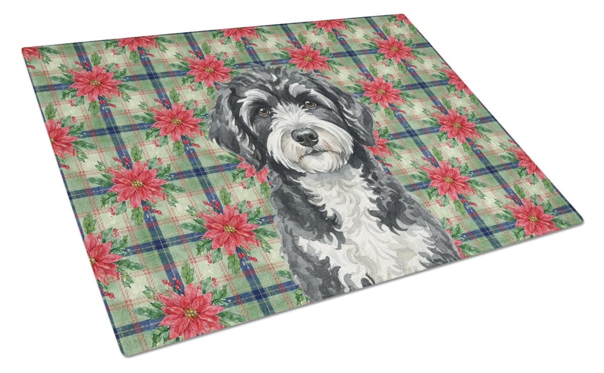 Picture of Carolines Treasures WDK8778LCB Unisex Adult Portuguese Water Dog Christmas Poinsettias Glass Cutting Board - 15 x 12 in.