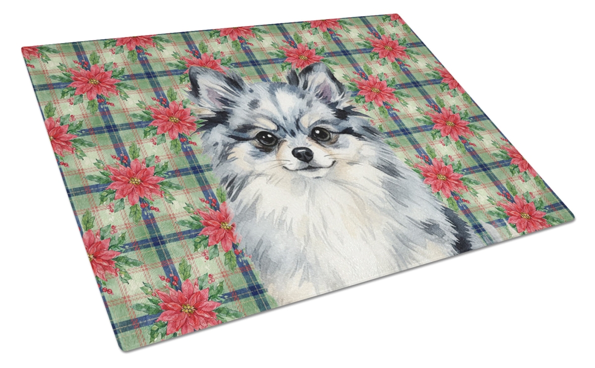 Picture of Carolines Treasures WDK8760LCB Unisex Adult Blue Merle Pomeranian Christmas Poinsettias Glass Cutting Board - 15 x 12 in.