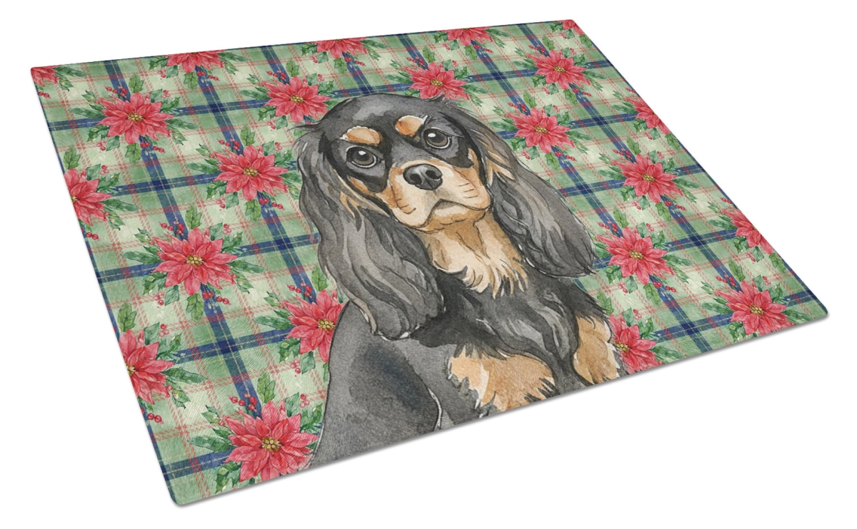 Picture of Carolines Treasures WDK8562LCB Unisex Adult Black & Tan Cavalier Spaniel Christmas Poinsettias Glass Cutting Board - 15 x 12 in.