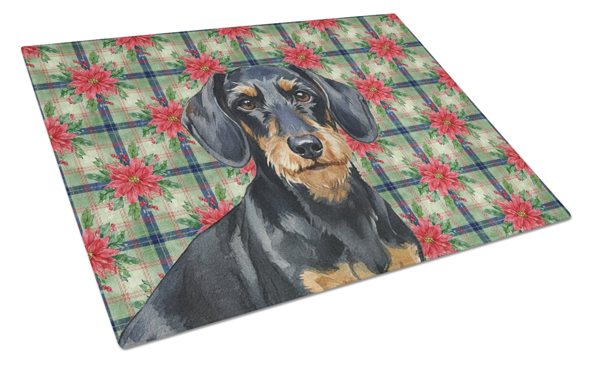 Picture of Carolines Treasures WDK8601LCB Unisex Adult Wirehaired Black & Tan Dachshund Christmas Poinsettias Glass Cutting Board - 15 x 12 in.
