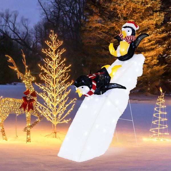 CM24281US 4 ft. Christmas Penguin Ice Skating Decor with Snowy Slide - Black, White & Yellow