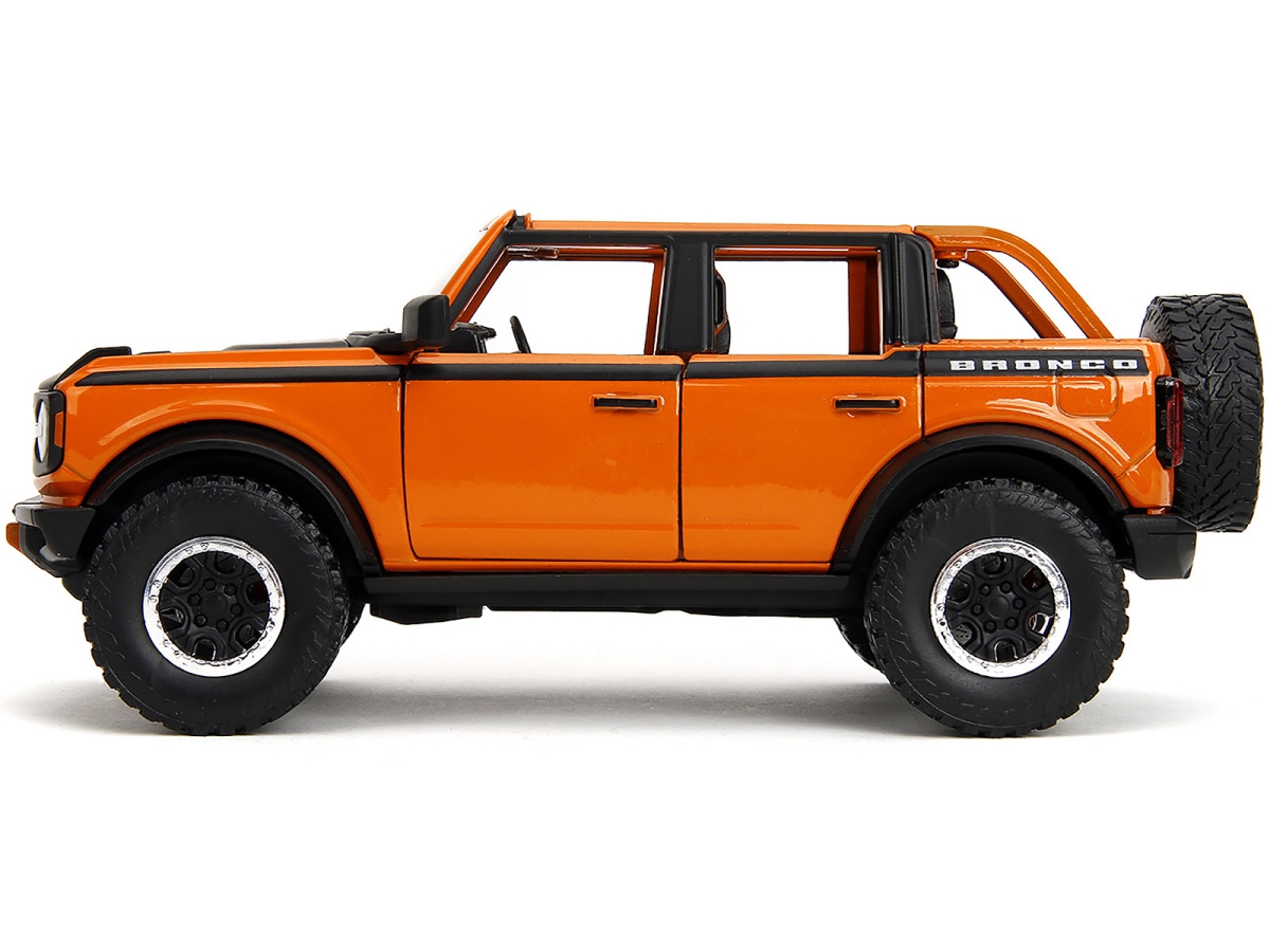Jada 34189 2021 Ford Bronco Open-Top Orange with Black Stripes & Hood with Extra Wheels Just Trucks Series 1 by 24 Diecast Model