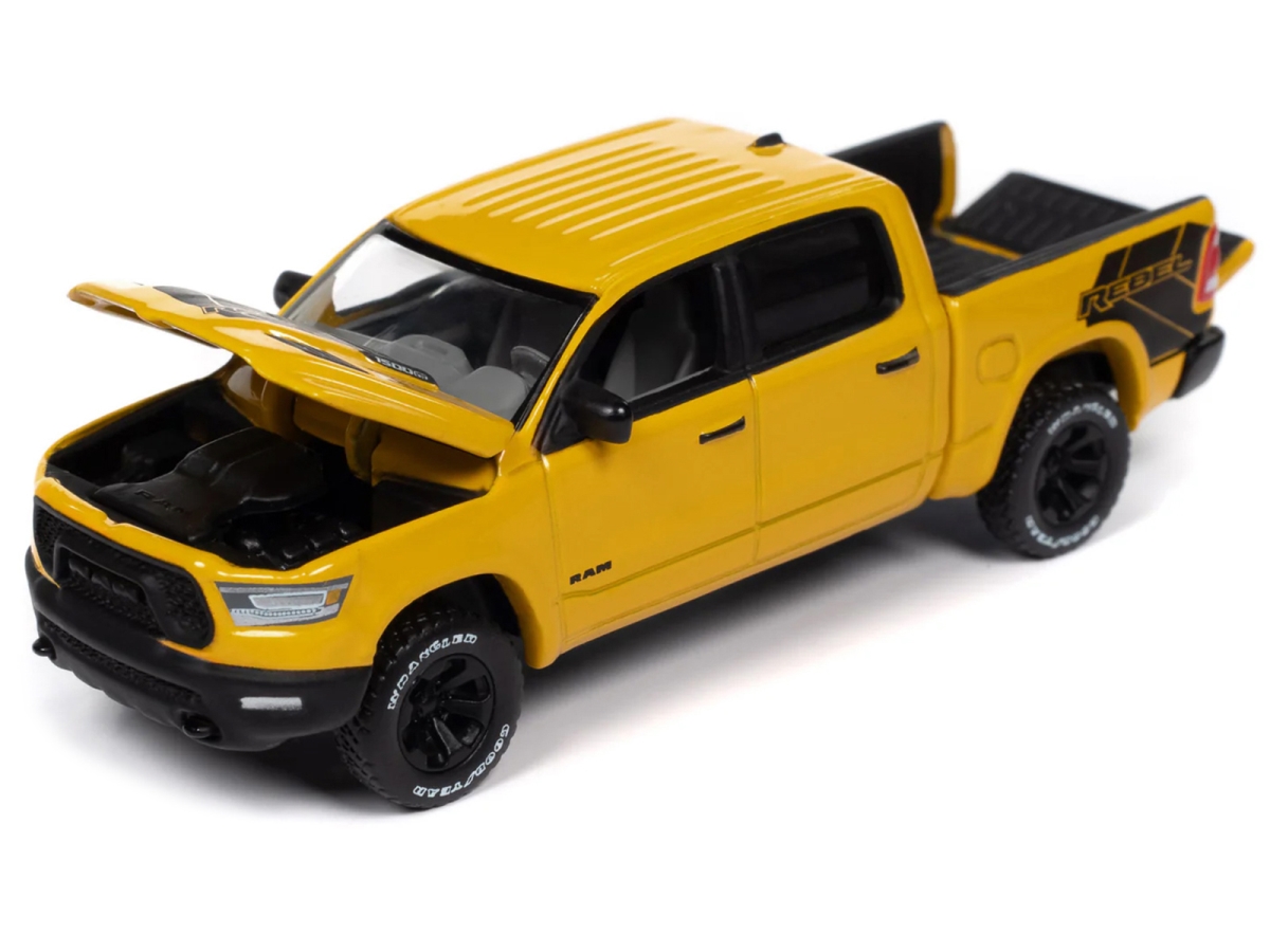 Picture of Autoworld 64462-AWSP164A 2023 Ram 1500 Rebel Havoc Edition Pickup Truck Baja Yellow Muscle Trucks Series 1 by 64 Diecast Model