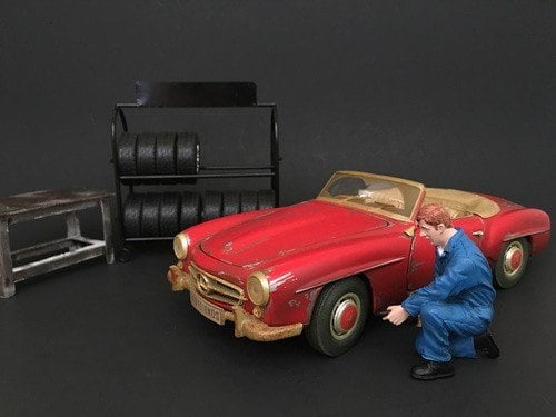 Picture of American Diorama 77496 Mechanic Tony Inflating Tire Figure for 1 isto 24 Scale Models