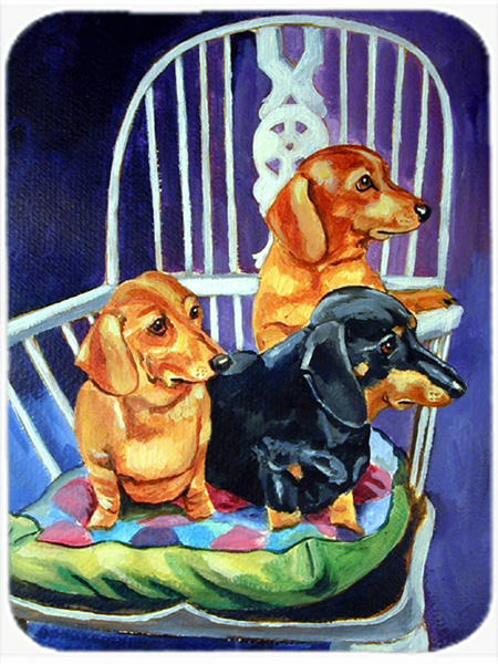 Picture of Carolines Treasures 7025LCB Dachshunds Two Red and a Black and Tan Glass Cutting Board - Large- 15 x 12 in.