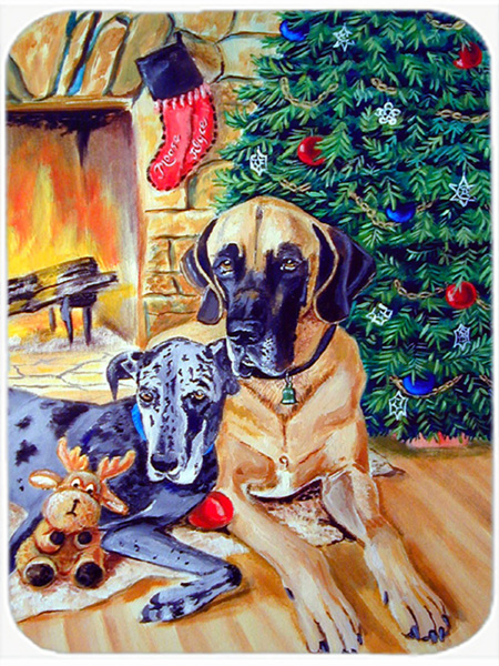 Picture of Carolines Treasures 7111LCB Harlequin and Blue Great Danes Under the Christmas Tree Cutting Board - 15 x 12 in.