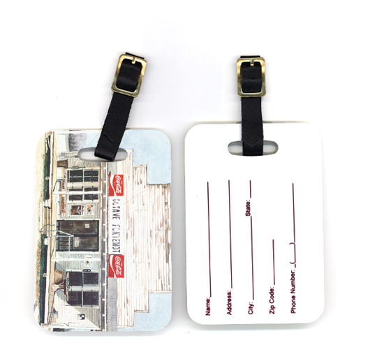 Pair of Octave Fontenot Luggage Tag