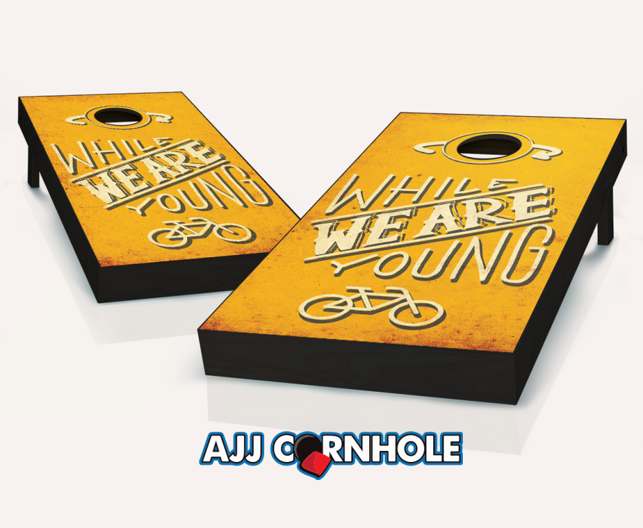 Picture of AJJCornhole 107-WhileWeAreYoung While We Are Young Theme Cornhole Set with Bags - 8 x 24 x 48 in.