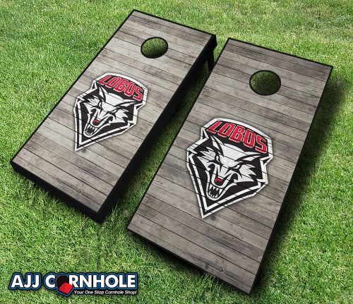 Picture of AJJCornhole 110-NewMexicoDistressed New Mexico Lobos Distressed Theme Cornhole Set with Bags - 8 x 24 x 48 in.
