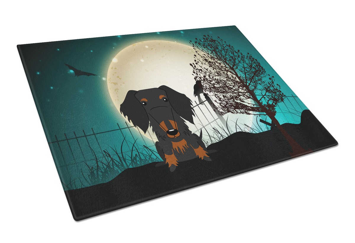 Picture of Carolines Treasures BB2317LCB Halloween Scary Wire Haired Dachshund Black & Tan Glass Cutting Board, Large