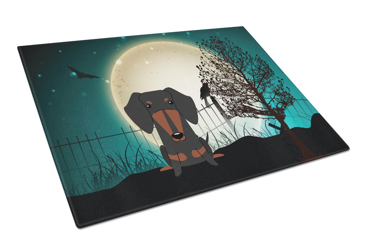 Picture of Carolines Treasures BB2322LCB Halloween Scary Dachshund Black & Tan Glass Cutting Board, Large