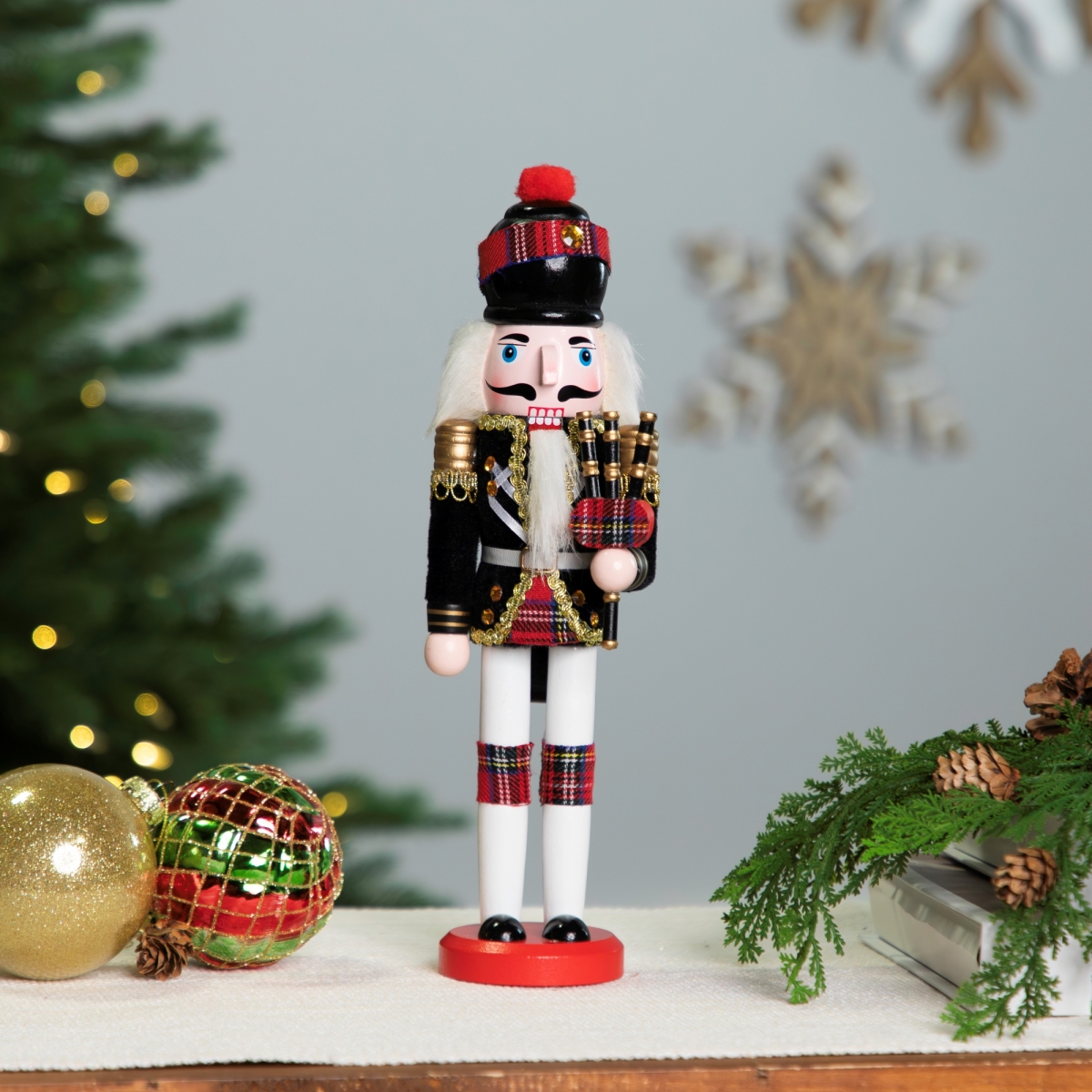Picture of Northlight Seasonal 35766406 12 in. Mini Bagpiper Nutcracker Christmas Figure&#44; Black & Red