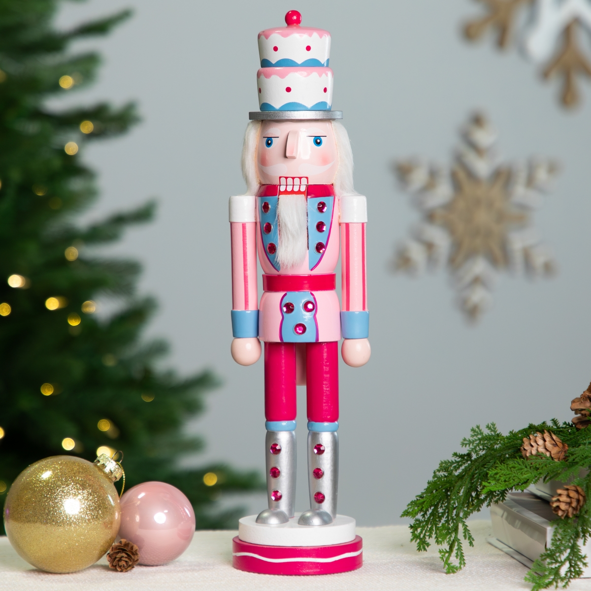Picture of Northlight Seasonal 35766397 15 in. Cake King Nutcracker Christmas Figure&#44; Pink & Blue