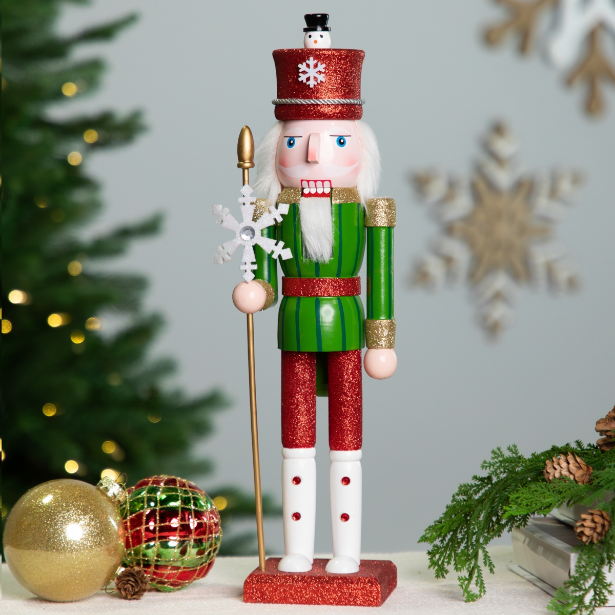 Picture of Northlight Seasonal 35766398 15 in. Glittered Nutcracker with Snowflake Sceptre Christmas Figure&#44; Red & Green