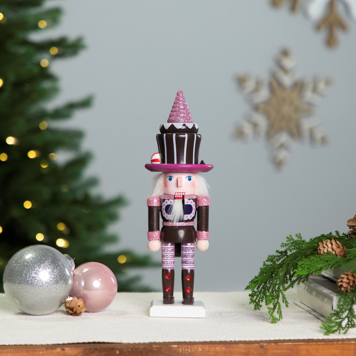 Picture of Northlight Seasonal 35766404 10 in. Cupcake Nutcracker Christmas Figure&#44; Brown & Pink