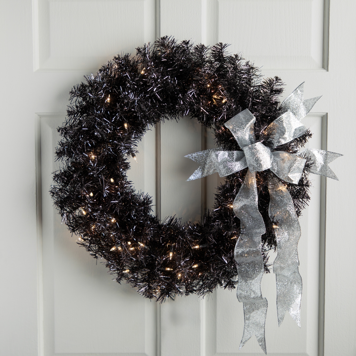 35764367 24 in. Black Pre-Lit Artificial Halloween Tinsel Wreath - Clear Lights