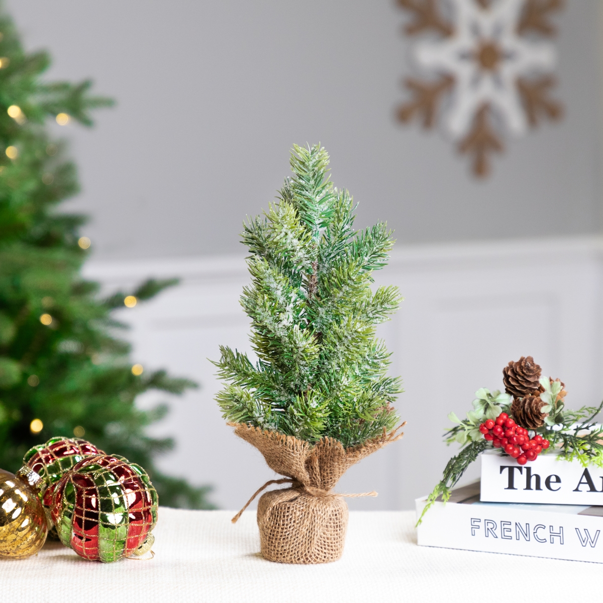 34865480 11.75 in. Frosted Icy Pine in Burlap Base Christmas Tree - Unlit