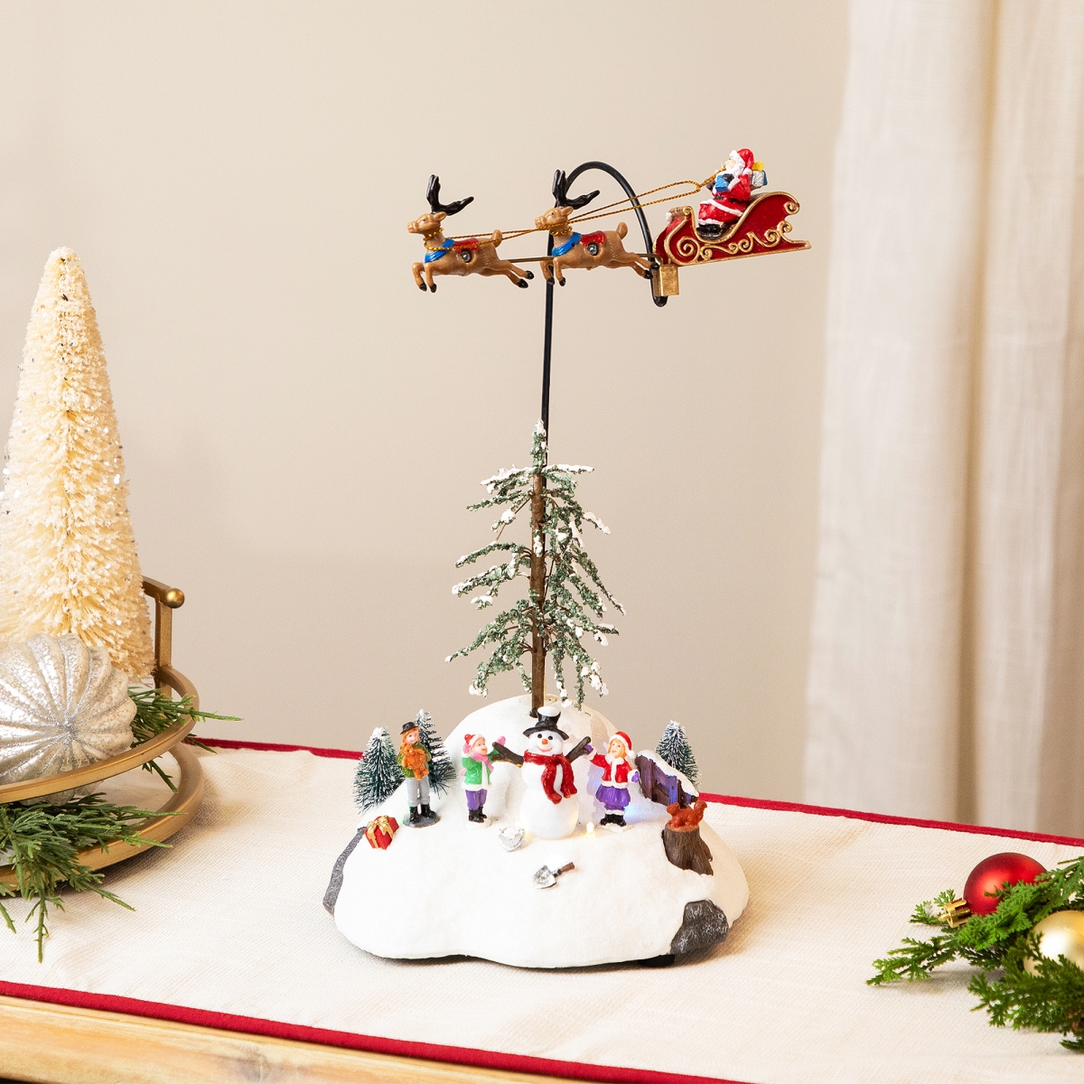 Picture of Northlight 35769690 LED Lighted & Musical Flying Santa Animated Christmas Village Display - 13.5 in.