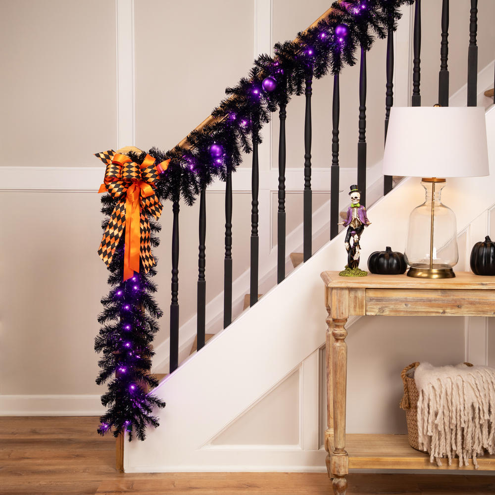 Picture of Northlight 35764748 9 ft. x 12 in. Pre-Lit Black Crystal Pine Artificial Halloween Garland - LED Purple