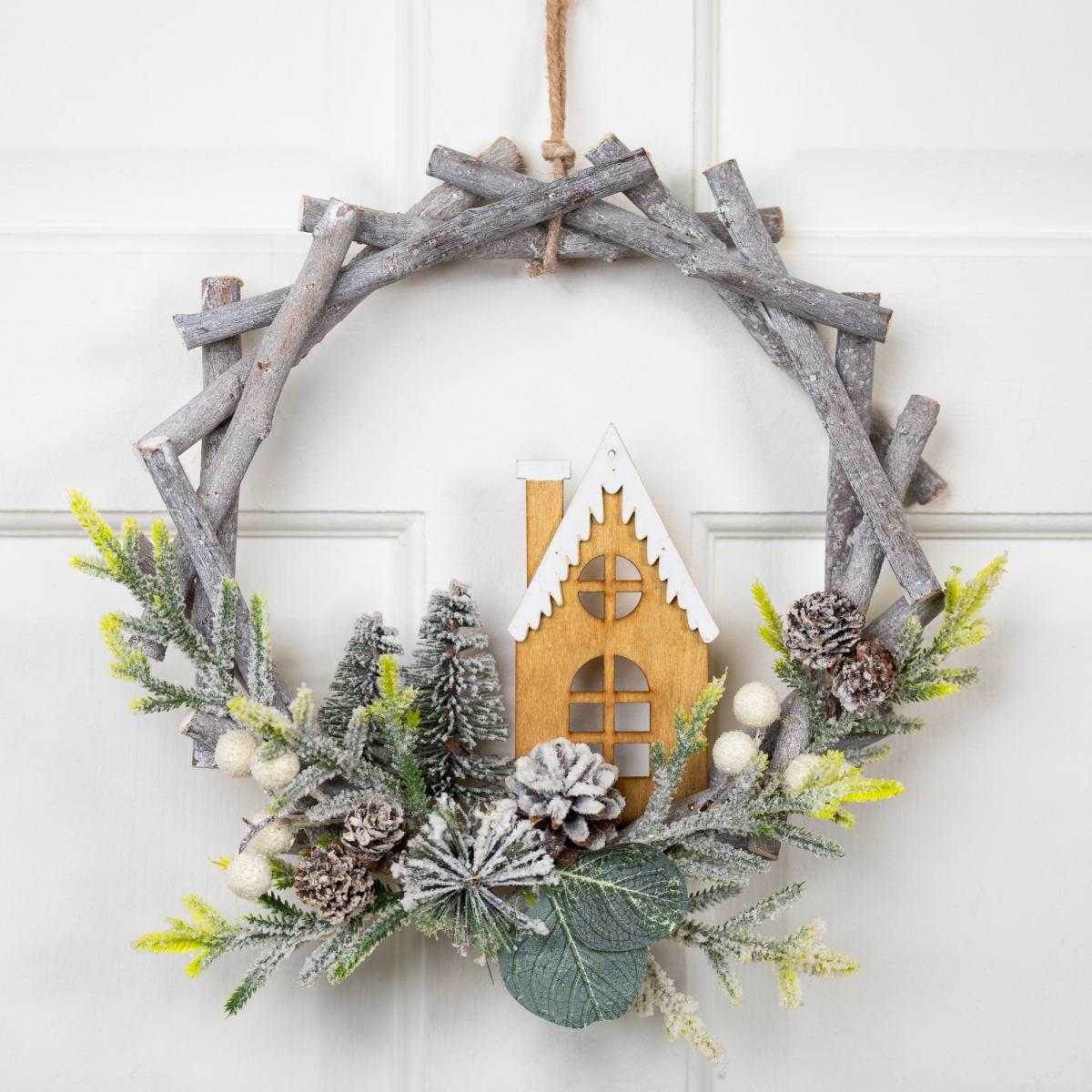 35849158 Unlit Flocked House & Pinecones Wood Branch Artificial Christmas Wreath - 12 in. - Brown