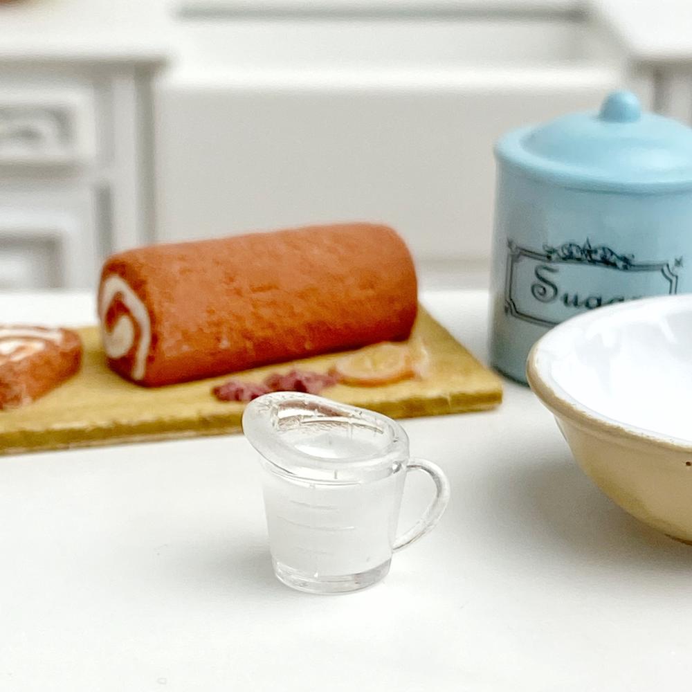 HR54328 Measuring Cup Filled with Milk for Dollhouse Miniatures
