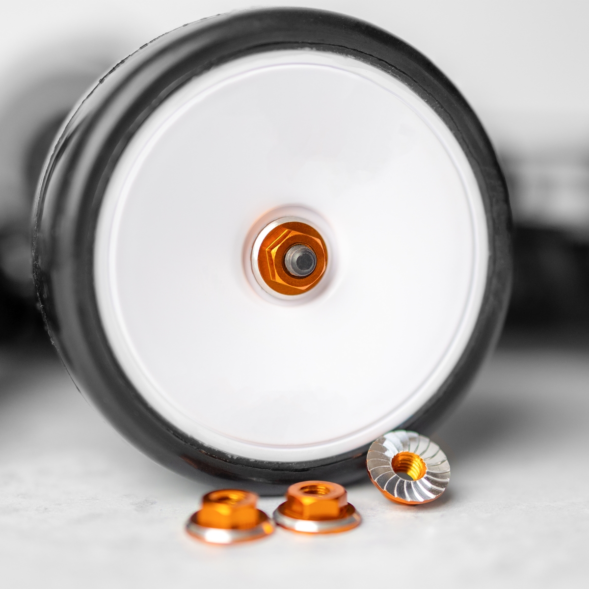 Picture of 1UP Racing 1UP80551 Orange Lockdown M4 Wheel Nuts - 4 Piece
