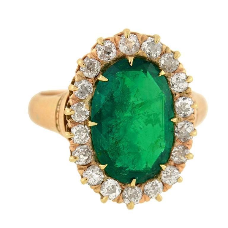7.50 CT Oval Emerald & Round Diamonds Ring, 14K Yellow Gold - Size 6.5