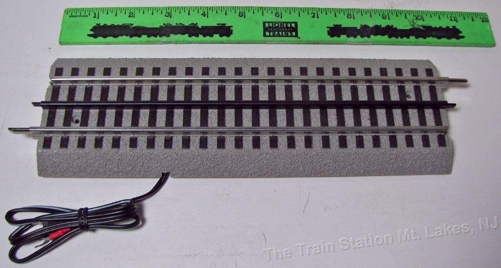 Picture of Lionel LNL12016 10 in. Fastrack Straight Track with Terinal Wire, Black