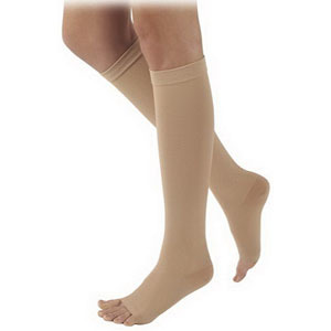 Picture of Sigvaris SG504NS4O77 Natural Rubber Thigh High Stockings with Grip-top, S4 Size - Natural