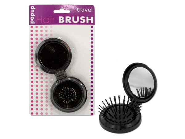 Picture of Kole Imports HB515-48 0.75 x 2.5 in. dia. Pop-up Travel Hair Brush - Pack of 48