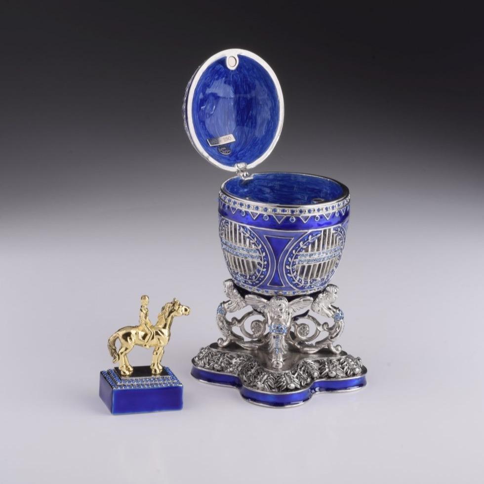 EX1974 Blue Russian Egg with Man Riding Horse Surprise Inside Enamel Painted Trinket Box with Austrian Crystals