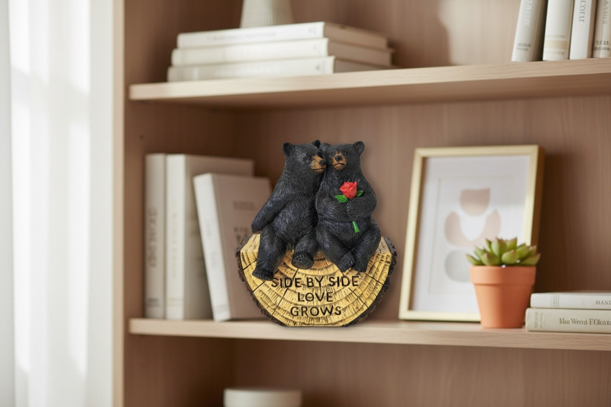 18033 D L C Bear Couple Sitting On Lumber