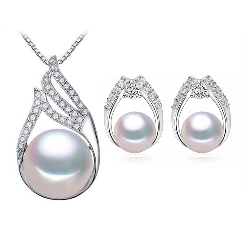 Picture of Majesty Diamonds MDS210081 Round White Freshwater Pearl Drop&#44; Dangle Earrings & Pendant Set in 0.925 White Sterling Silver