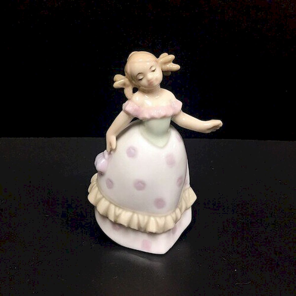 Girl with Pigtails Figurine