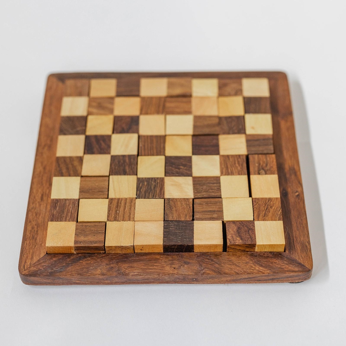 Picture of MDR Trading Inc. FP-IMW-035 Light&#44; Medium And Dark Brown Cubes In A Wooden Frame Checker Board Game