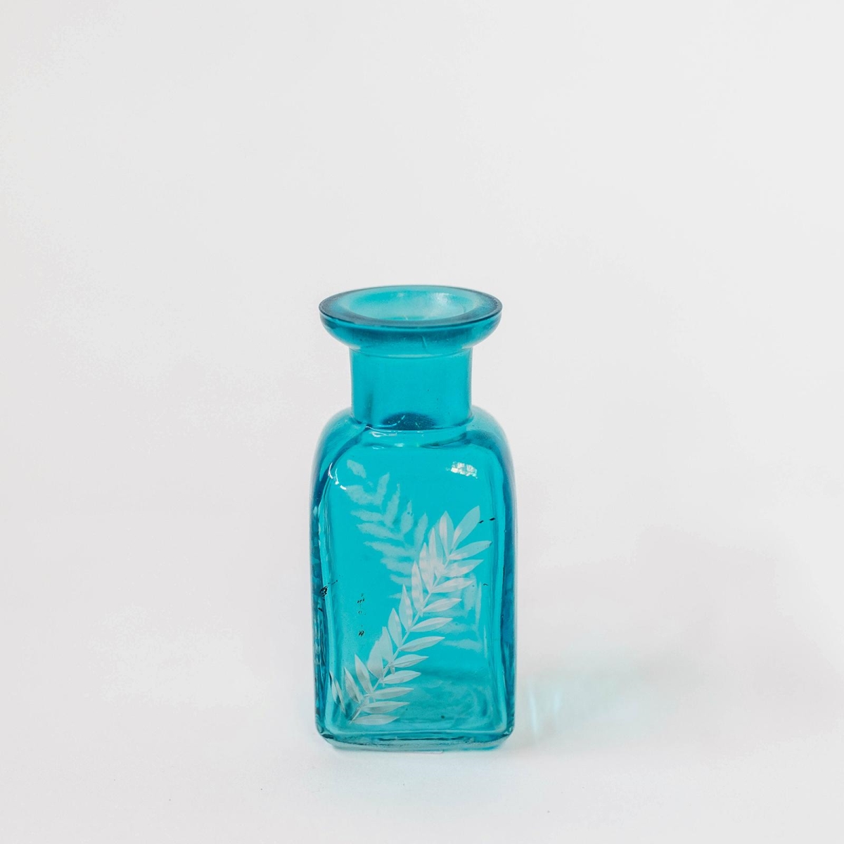 FP-IMW-051-Bl_Q01 Bright Blue With White Leaf Print Decorative Bottle