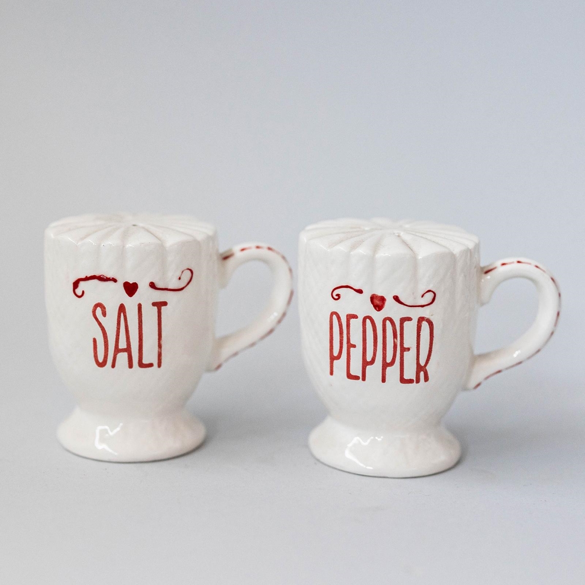 Picture of MDR Trading Inc. FP-WCJ-011_Q01 White Cup Shape With Red Accents Salt & Pepper Shaker