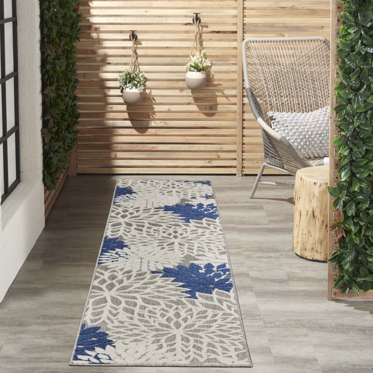 Picture of Nourison Home 99446778895 2 ft. 3 in. x 10 ft. Aloha Tropical Runner Rug - Ivory & Navy
