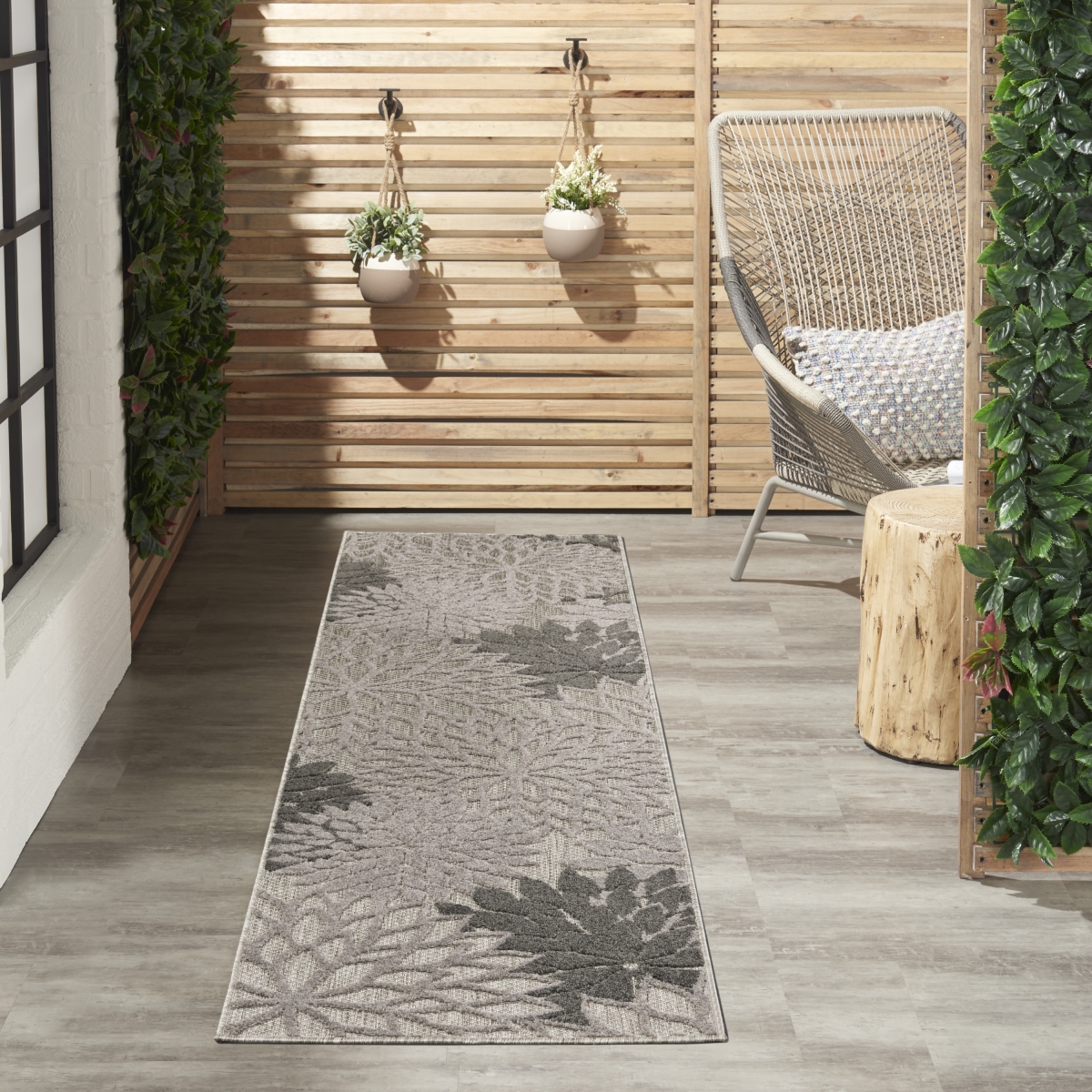 Picture of Nourison Home 99446779205 2 ft. 3 in. x 8 ft. Aloha Tropical Runner Rug - Silver & Gray