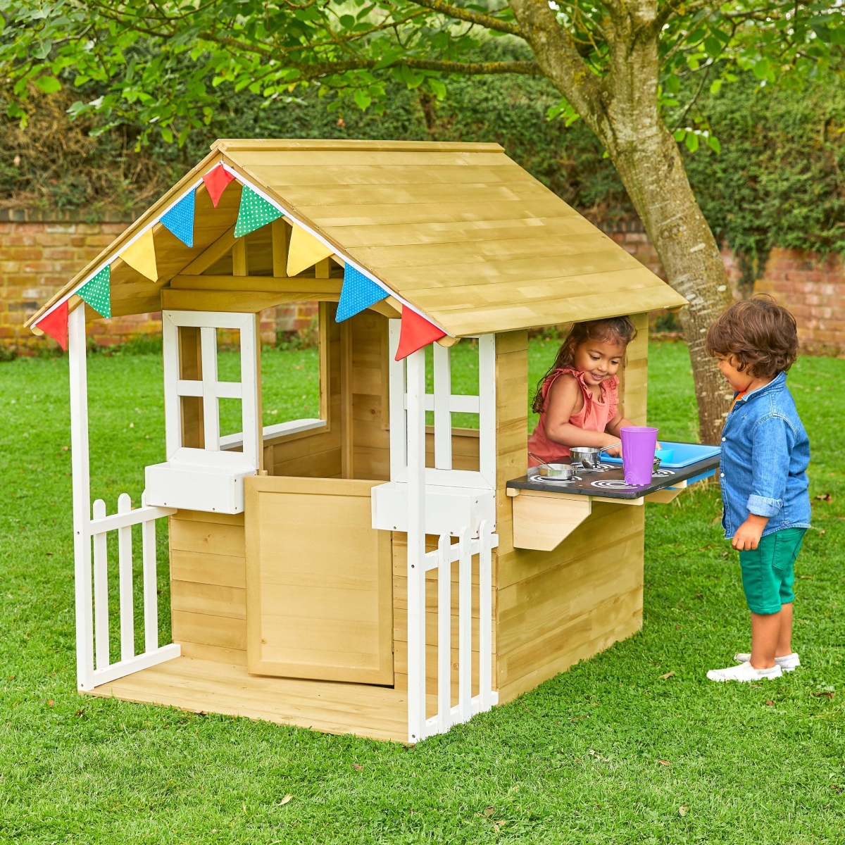 Picture of TP Toys TP383 Wooden Cubby House with Veranda & Kitchen&#44; Treated Natural Wood