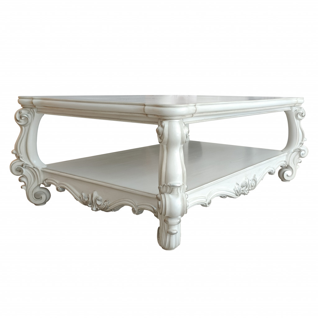 57 in. Antiqued White Rectangular Coffee Table with Shelf