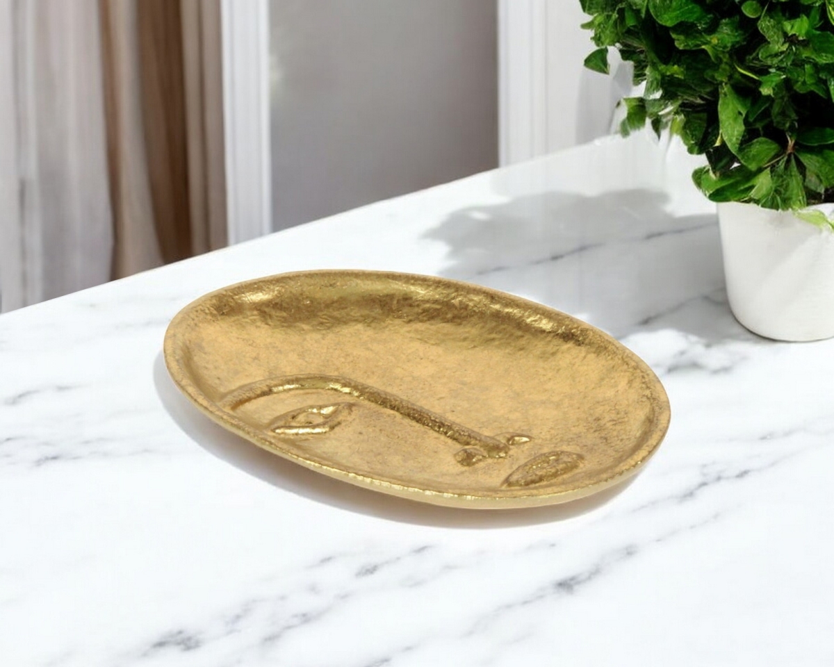 Picture of HomeRoots 571244 8 in. Gold Cast Iron Mod Abstract Face Oval Trinket Tray