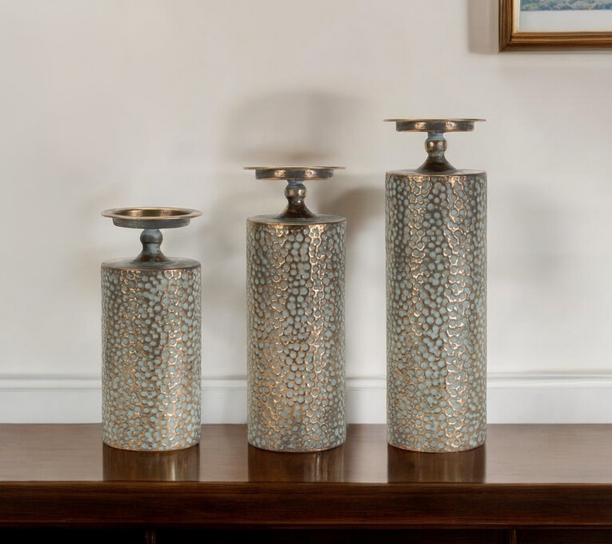 Picture of HomeRoots 517606 Bronze Metal Abstract Floor Pillar Candle Holders - Set of 3