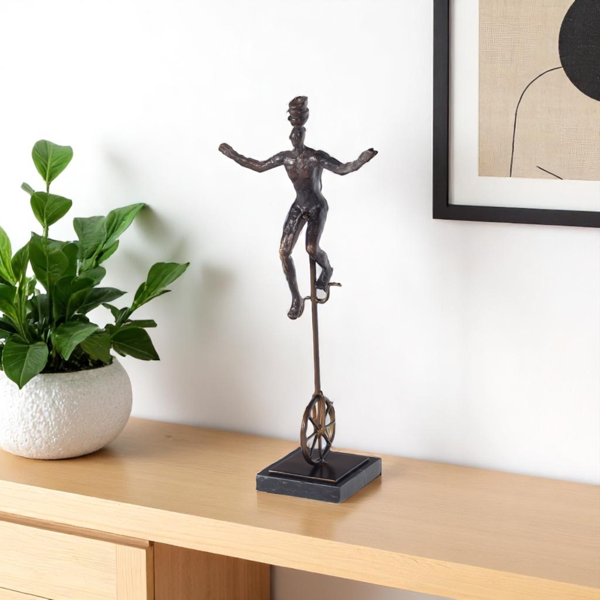 574103 16 in. Bronze Resin Unicycle Man Tabletop Sculpture