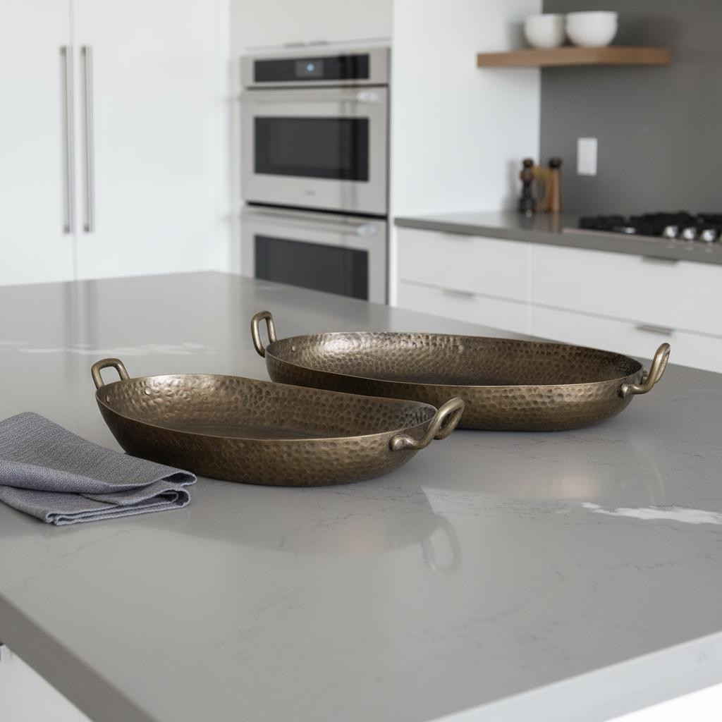 Picture of HomeRoots 609097 Gold Oval Metal Handmade Serving Tray with Handles, Set of 2