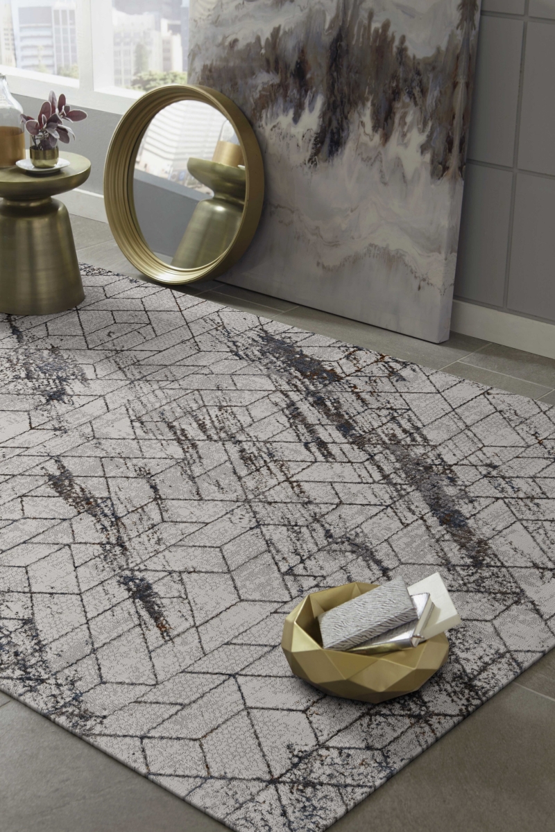 79 x 114 in. Ivory Polyester Rug