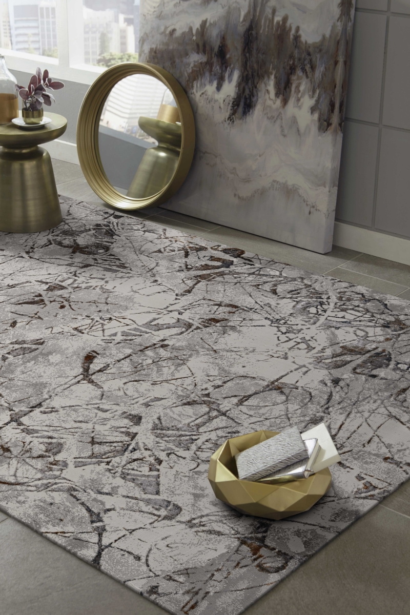 79 x 114 in. Ivory or Grey Polyester Rug