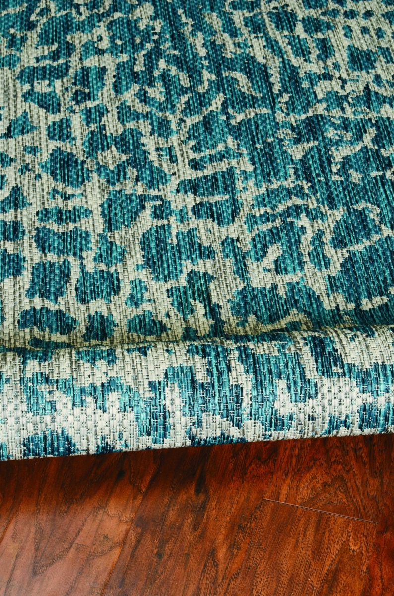 5 ft. 3 in. x 7 ft. 7 in. Teal Polypropylene Outdoor Rug