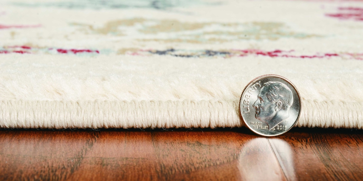 63 x 91 in. Ivory Polypropylene Rug